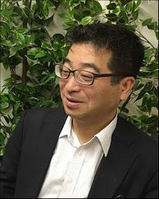 辻 義周 氏